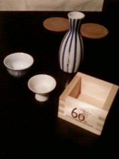 Sake drinking cups & jar.