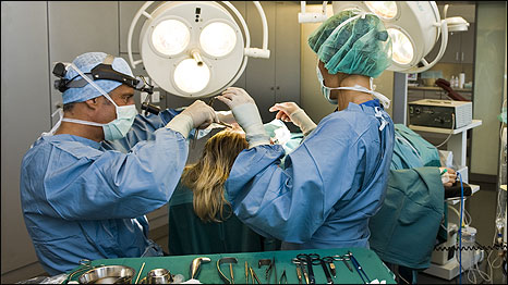 Dr Steiger (left) at work