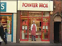 Keith Poynter outside shop
