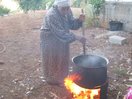 my grandmother is cooking apricot jam, it is very delicious and I like it very much. 