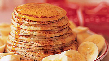Scotch pancakes with banana and maple syrup