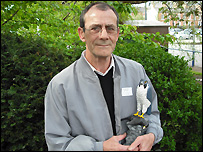 John Graley with his carving