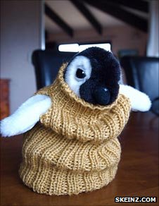Toy penguin models one of the jumpers