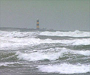 The lighthouse at St Johns Point in the distance