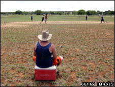 Cricketer sits on ice-box full of alcohol, Goldfield Ashes, N Queensland