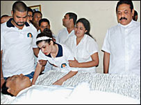 President Rajapaksa (R) paying last respects to Bharatha Lakshman Premachandra (file photo: LankaNewsWeb)