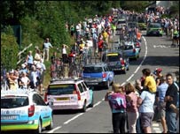 Supporters line the streets