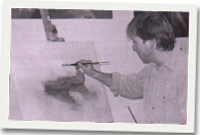 Andrew Lloyd Jones wrth ei waith fel arlunydd