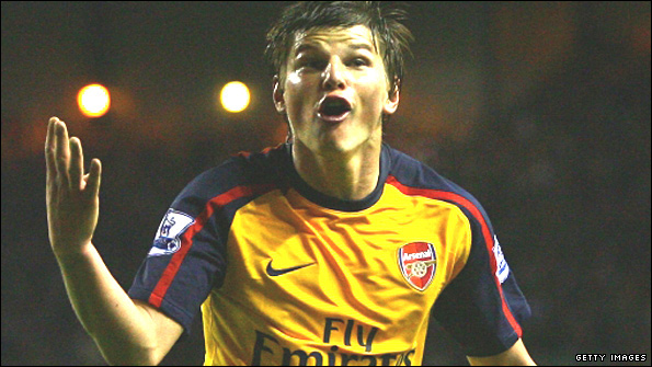 Andrey Arshavin celebrates his fourth goal against Liverpool
