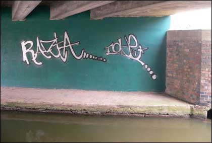 Graffiti under a canal bridge