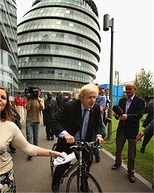 Boris cycling outside City Hall