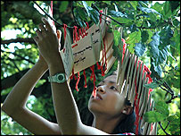 Helen Moore hanging her wish 