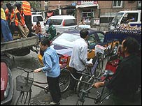 Dopravní zmatek na ulicích Pekingu