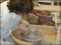 A person making pottery