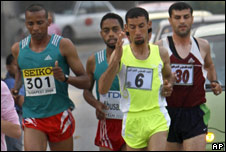 Palestinian runners including Nader el Masri (in yellow) participate in the first Gaza marathon
