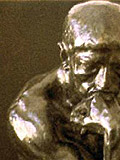Auguste Rodin's The Thinker, a statue of a man deep in thought