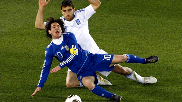 Messi had to be patient to avoid the clutches of Greece's Sokratis Papastathopoulos