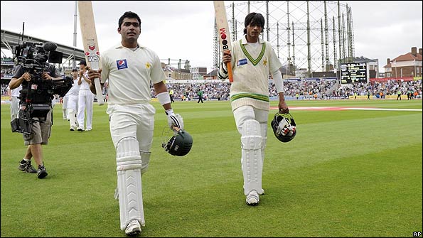 Umar Akmal and Mohammad Aamer celebrate the win over England