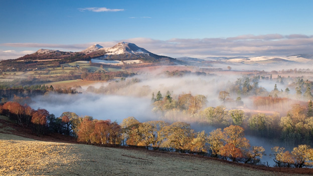 The Eildon Hills, in the Scottish Borders, with a misty Tweed Valley in the foreground
