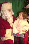 Santa with a young child