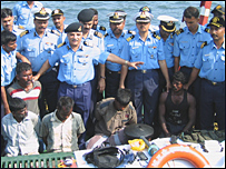 Indian coast guargs with seized arms