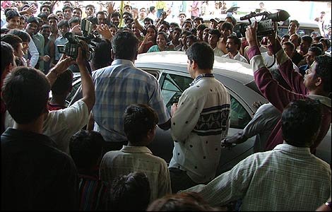 Mobbed by press photographers