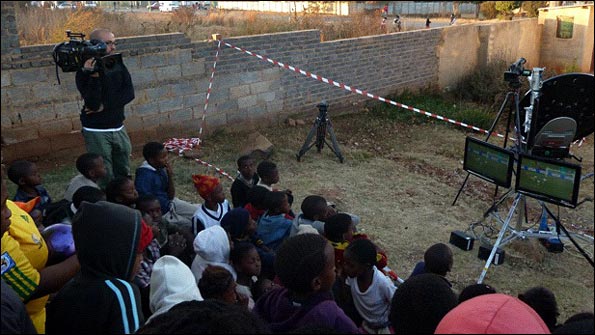 The children watch the Ghana v Australia game