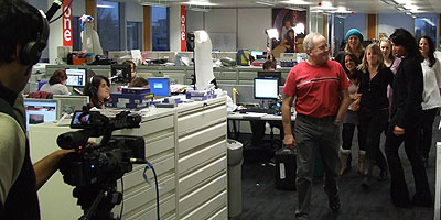 Dave and Christine in the production office, recording the pre-titles film