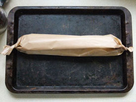 Parchment wrapped roly-poly.