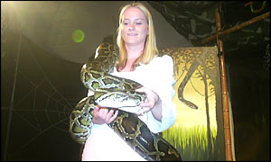 Kerry looks after Ellie the python