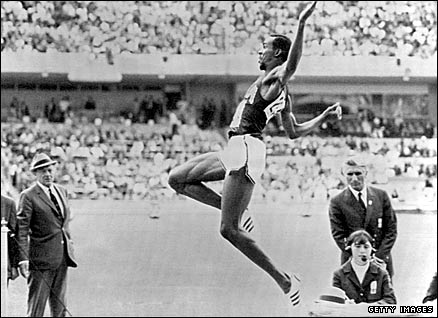 Bob Beamon breaks the world long jump record at the 1968 Mexico Olympics