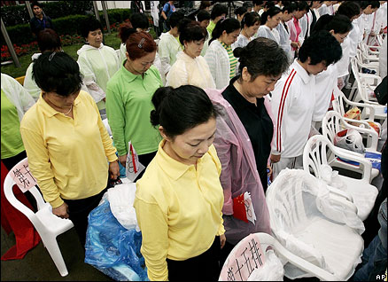 A minute's silence was observed on Tuesday at an Olympic torch relay event