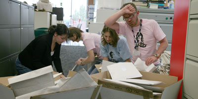 Director Mat and the team packing T-shirts