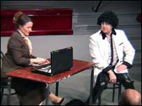 Man and woman on stage 203