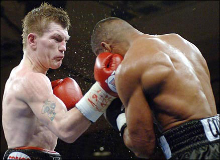 Ricky Hatton (left) lands on uppercut on Juan Urango during their IBF and IBO light-welterweight fight in January