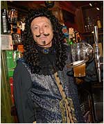 Behind the bar pulling pints again.