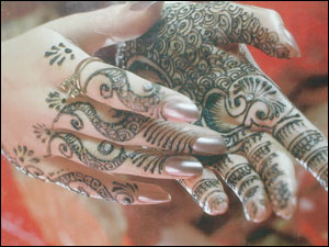 Hands decorated with henna