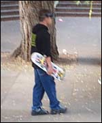 Teenager with skateboard