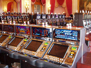 Rows and rows of slot machines in the casino