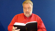 Roy reading a book