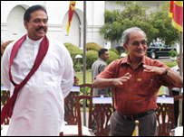 JVP leader, Mr. Amerasinghe (R) with President Rajapaksa