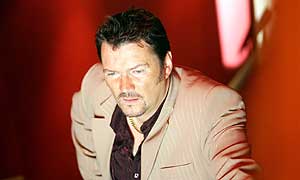 Ian Puleston-Davies as Shirley Woolf