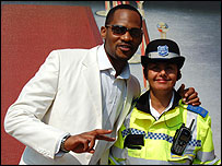 'Will' poses with a community police officer
