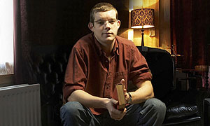 Russell Tovey plays George