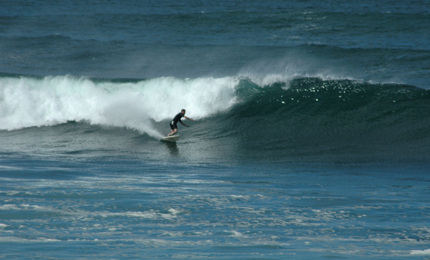 Goofy foot heaven. Western point break, and Mark finds a line. Pic: Jay Sept 06