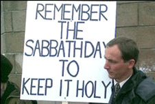 A protester holding a banner
