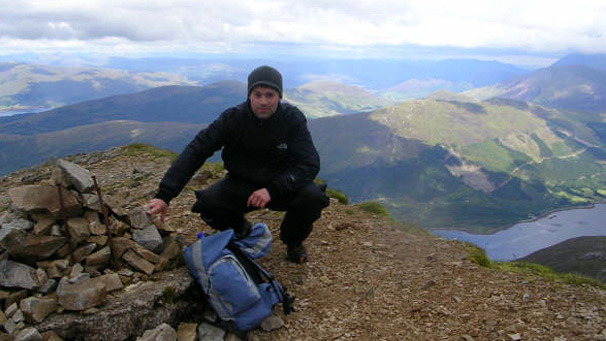 Man at the top of the Sgurr Dearg