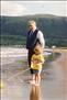 Sarah, when she was three years old, with her grandfather on Glenarriff beach