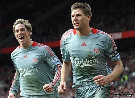 Fernando Torres and Steven Gerrard celebrate Liverpool's win