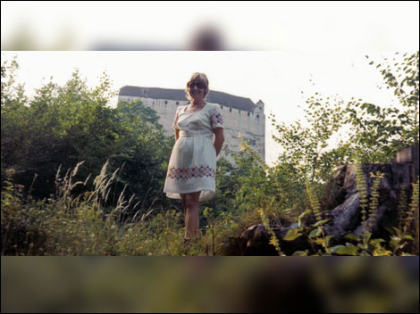 Woman infront of a castle 470